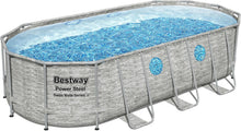 Load image into Gallery viewer, Bestway 56946 Piscine Power Steel™ Swim Vista ovale 488 x 305 x 107 cm motif rotin avec hublots, filtration à sable, échelle, bâche et diffuseur Chemconnect™